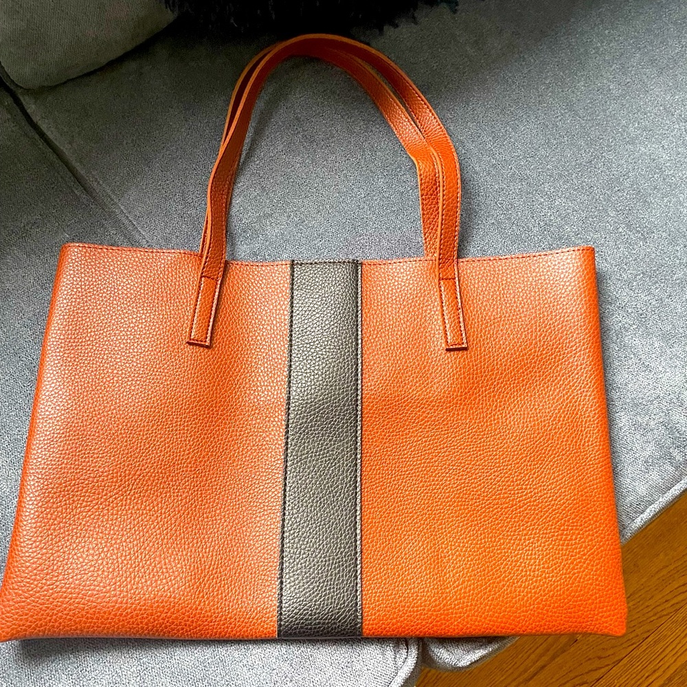 New VINCE CAMUTO bag. Measurements 12” width 17” length. Pristine bag
